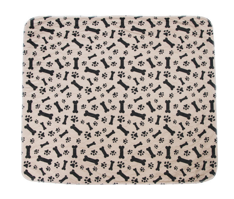 3-layer waterproof pet pad with black bone and paw print pattern, reusable and machine washable absorbent mat for dogs and cats