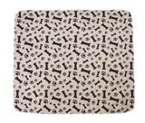 3-layer waterproof pet pad with black bone and paw print pattern, reusable and machine washable absorbent mat for dogs and cats