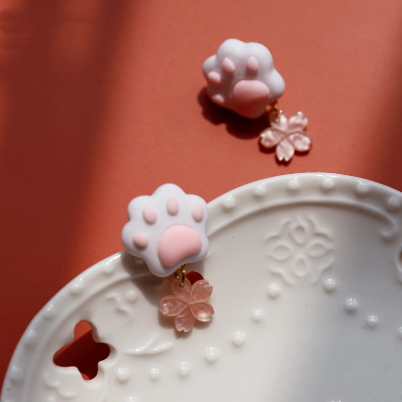 Cat shaped earrings.
