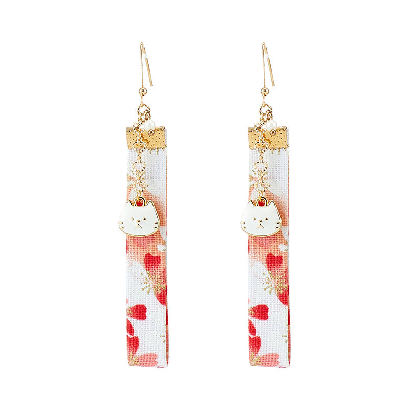 Cat shaped earrings.