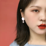 Cat shaped earrings.