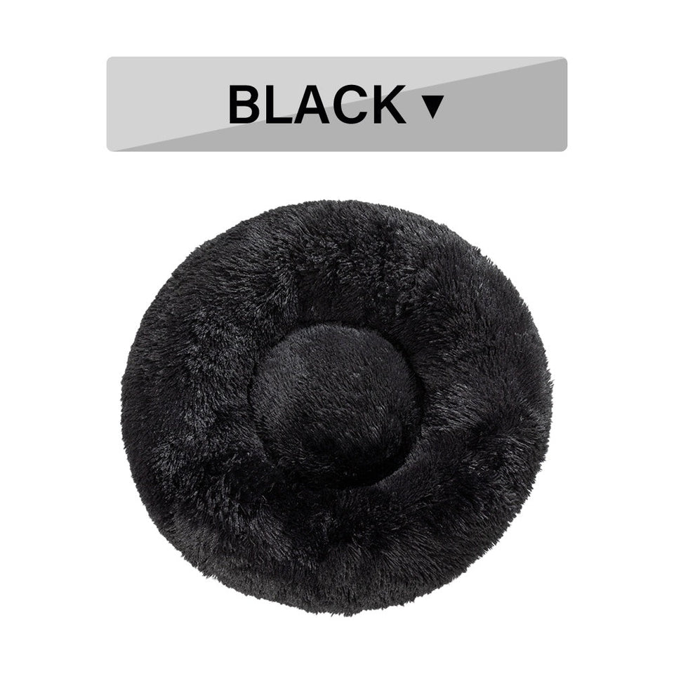 Fluffy Donut Dog Bed in black, ultra-plush round calming pet bed for cats and dogs with raised rim and soft long plush fabric.