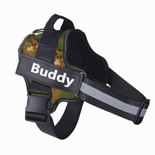 Reflective adjustable no-pull dog harness in camouflage pattern with personalized name patch and sturdy handle for control and comfort.