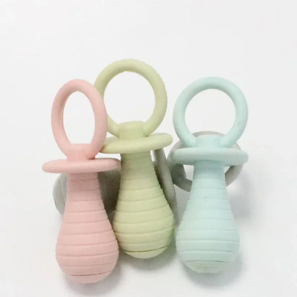 Pet Pacifier Rubber ToysAmalgamite Pets My StoreCatMaterial: TPR
 
 Product category: biting toys
 
 Color: green, pink, gray, blue
 
 Product weight: 0.05kgPet Pacifier Rubber Toys For Newborn Dogs Cat