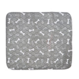 Gray 3-layer waterproof pet absorbent pad with white bone pattern, reusable and machine washable, leak-proof for dogs and cats.