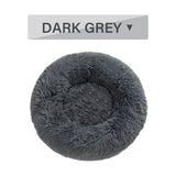 Dark grey fluffy donut dog bed with ultra-plush, calming design for cats and dogs