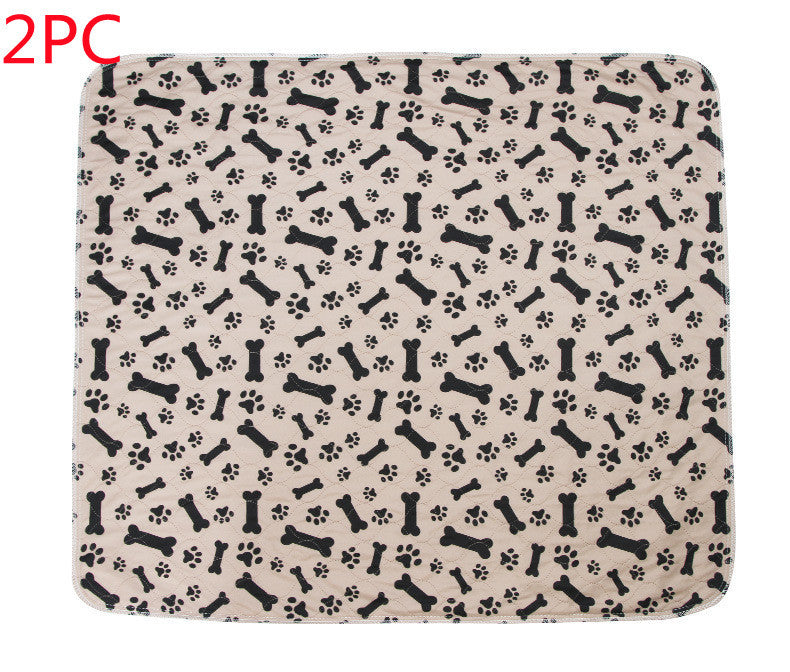 3-layer waterproof pet pad with bone and paw print pattern, reusable and machine washable pee pad for dogs and cats