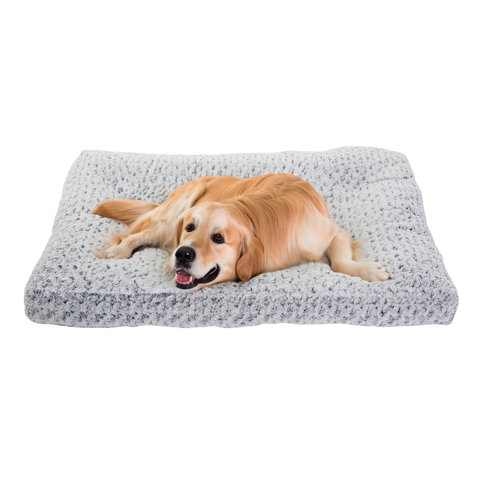 Golden retriever lying on a soft gray luxury rose velvet dog bed with plush cushioning and raised edges for joint support