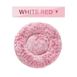 Fluffy Donut Dog Bed in soft white and red plush, round cozy pet bed for cats and dogs.