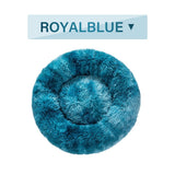 Royal blue fluffy donut dog bed with ultra-plush calming design for cats and dogs